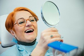 Dental implants can save you money by reducing your replacement costs