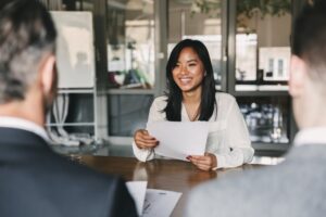 professional woman smiling and having a job interview